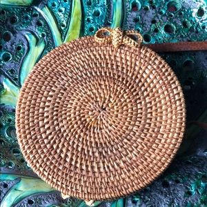Gently used round rattan shoulder bag